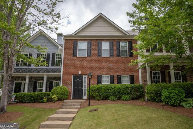 96 Portico Pl, Newnan, GA 30265 - view of front of property featuring a front yard and brick siding