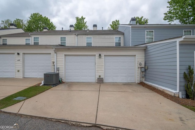 96 Portico Pl, Newnan, GA 30265 - garage with central AC unit and driveway