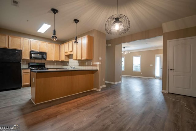 96 Portico Pl, Newnan, GA 30265 - kitchen with a peninsula, light brown cabinetry, open floor plan, black appliances, and tasteful backsplash