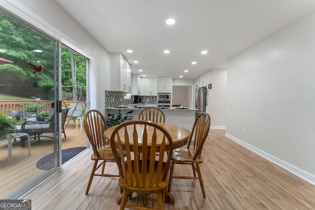 5830 Wilbanks Dr, Peachtree Corners, GA 30092 - dining room featuring light wood-style floors, recessed lighting, and baseboards