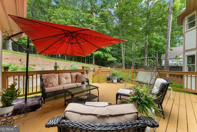 5830 Wilbanks Dr, Peachtree Corners, GA 30092 - wooden deck featuring an outdoor living space, a fenced backyard, and view of scattered trees