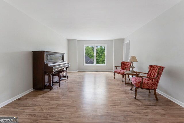 5830 Wilbanks Dr, Peachtree Corners, GA 30092 - living area with baseboards and wood finished floors