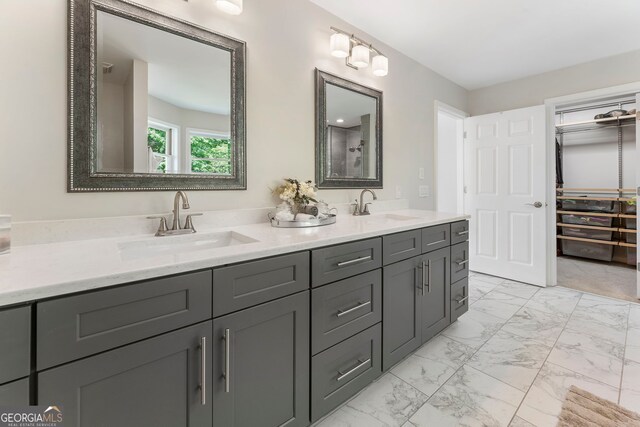 5830 Wilbanks Dr, Peachtree Corners, GA 30092 - bathroom featuring marble finish flooring, double vanity, and a spacious closet
