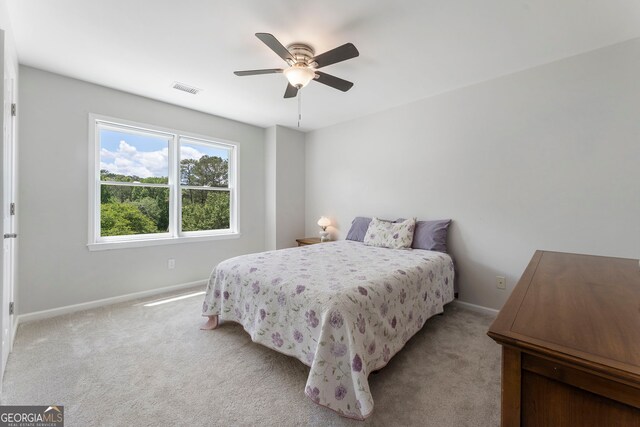 5830 Wilbanks Dr, Peachtree Corners, GA 30092 - bedroom with baseboards, carpet floors, and ceiling fan