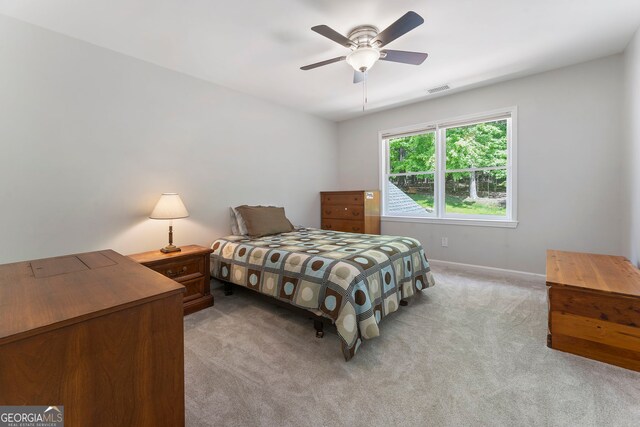 5830 Wilbanks Dr, Peachtree Corners, GA 30092 - bedroom with light colored carpet, baseboards, and ceiling fan
