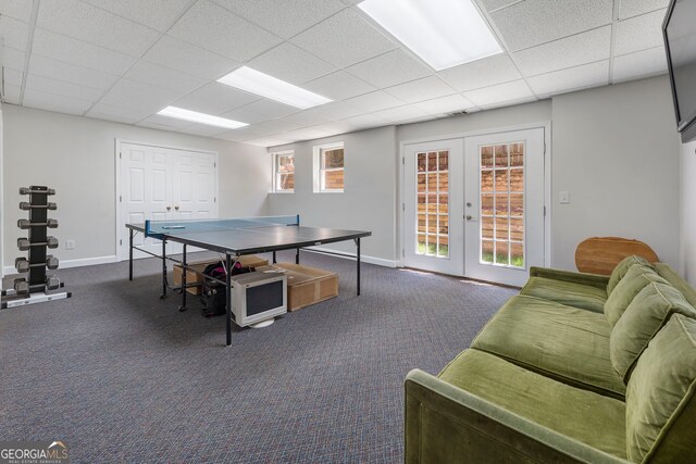 5830 Wilbanks Dr, Peachtree Corners, GA 30092 - game room featuring french doors, a drop ceiling, dark colored carpet, and baseboards
