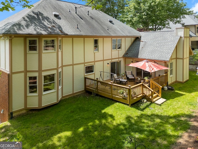 5830 Wilbanks Dr, Peachtree Corners, GA 30092 - rear view of property with a shingled roof, stucco siding, a yard, and a deck