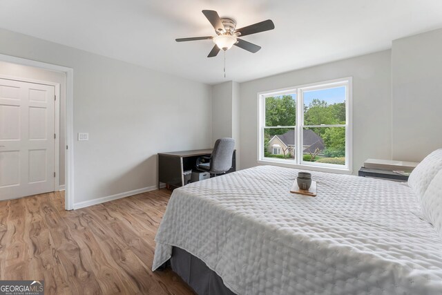 5830 Wilbanks Dr, Peachtree Corners, GA 30092 - bedroom featuring light wood finished floors, baseboards, and a ceiling fan