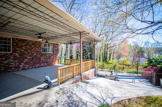 1181 Angelia Dr SW, Mableton, GA 30126 - view of patio / terrace featuring a ceiling fan, fence, and a carport