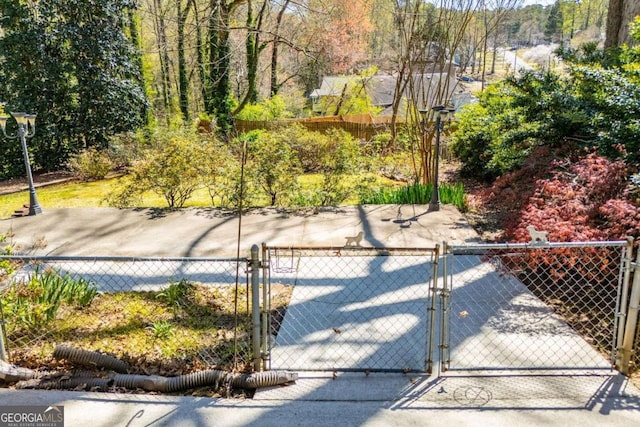 1181 Angelia Dr SW, Mableton, GA 30126 - view of property's community with fence and a gate
