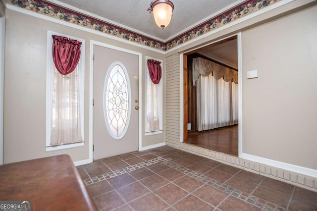 1181 Angelia Dr SW, Mableton, GA 30126 - entryway with baseboards and dark tile patterned flooring