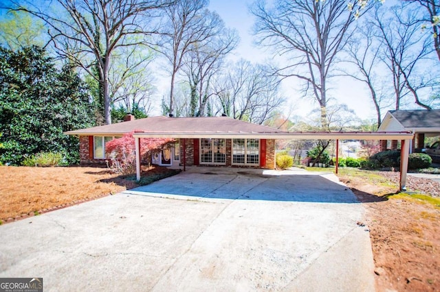 1181 Angelia Dr SW, Mableton, GA 30126 - view of vehicle parking featuring concrete driveway