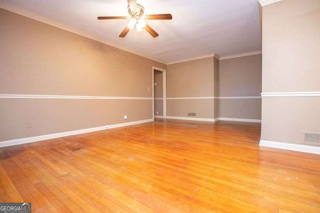 1181 Angelia Dr SW, Mableton, GA 30126 - unfurnished room with a ceiling fan, visible vents, baseboards, light wood-style floors, and ornamental molding