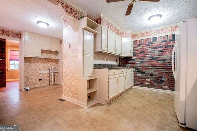 1181 Angelia Dr SW, Mableton, GA 30126 - kitchen featuring freestanding refrigerator, a textured ceiling, baseboards, ceiling fan, and open shelves