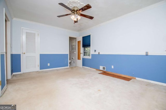 1181 Angelia Dr SW, Mableton, GA 30126 - unfurnished bedroom with crown molding, visible vents, baseboards, and carpet floors