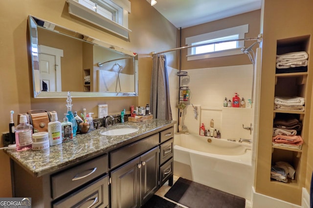 308 N Midland Ave, Monroe, GA 30655 - bathroom featuring vanity and shower / bathtub combination with curtain