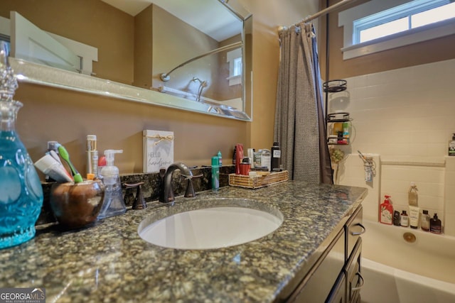 308 N Midland Ave, Monroe, GA 30655 - bathroom with vanity and shower / tub combo