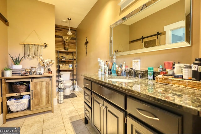 308 N Midland Ave, Monroe, GA 30655 - bathroom featuring toilet, tile patterned flooring, vanity, and visible vents