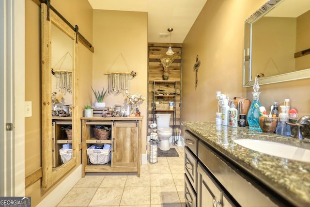 308 N Midland Ave, Monroe, GA 30655 - bathroom featuring toilet, tile patterned floors, and vanity