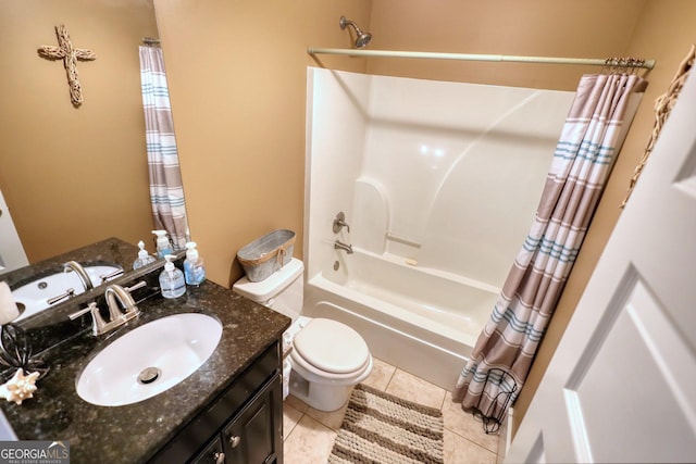 308 N Midland Ave, Monroe, GA 30655 - bathroom featuring shower / bath combo with shower curtain, toilet, tile patterned flooring, and vanity
