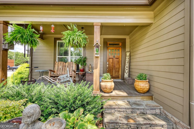 308 N Midland Ave, Monroe, GA 30655 - view of exterior entry featuring covered porch