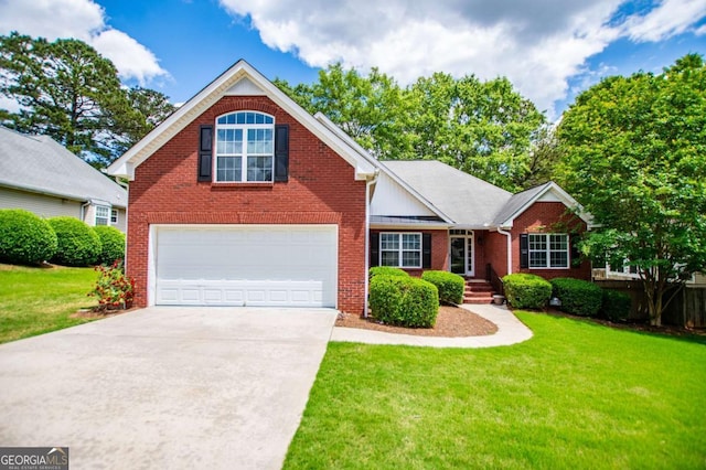 traditional-style home with concrete driveway, brick siding, a garage, and a front lawn