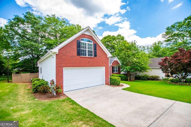 view of front facade featuring driveway, brick siding, fence, an attached garage, and a front lawn