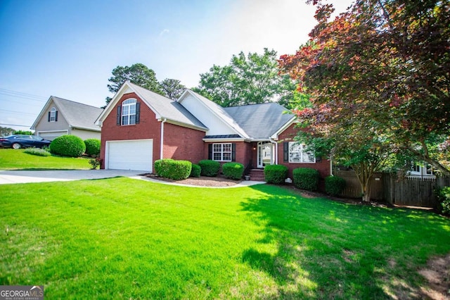 traditional-style home with driveway, brick siding, fence, a garage, and a front lawn