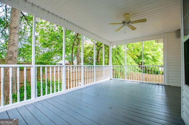wooden terrace with ceiling fan