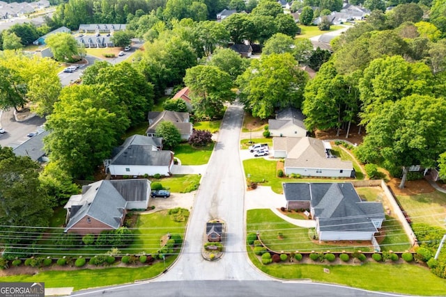 birds eye view of property with a residential view