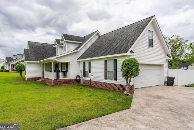 3808 Deer Run Dr, Blackshear, GA 31516 - view of front facade featuring a porch, an attached garage, a shingled roof, and driveway