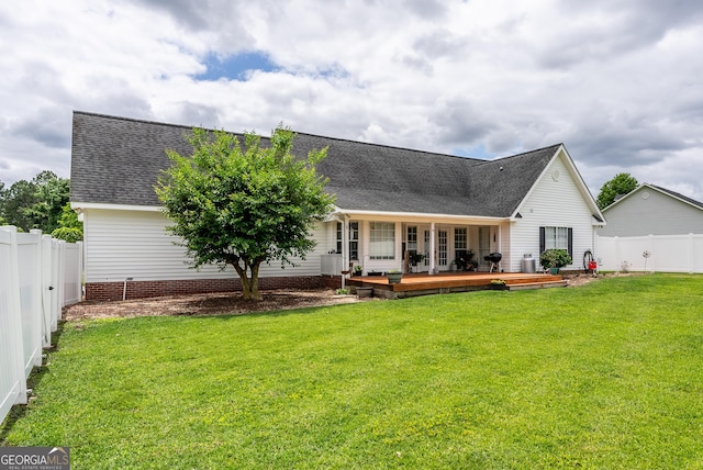 3808 Deer Run Dr, Blackshear, GA 31516 - rear view of property featuring a yard, roof with shingles, and a fenced backyard