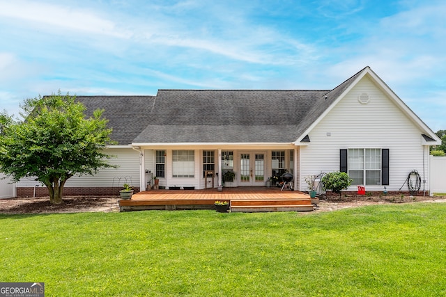 3808 Deer Run Dr, Blackshear, GA 31516 - rear view of property with a lawn, roof with shingles, french doors, and a wooden deck