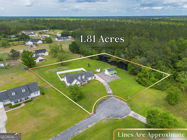 3808 Deer Run Dr, Blackshear, GA 31516 - birds eye view of property featuring a residential view and a view of trees