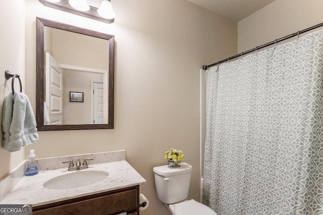6280 Stillwood Ln, Cumming, GA 30041 - bathroom featuring toilet, vanity, and a shower with shower curtain