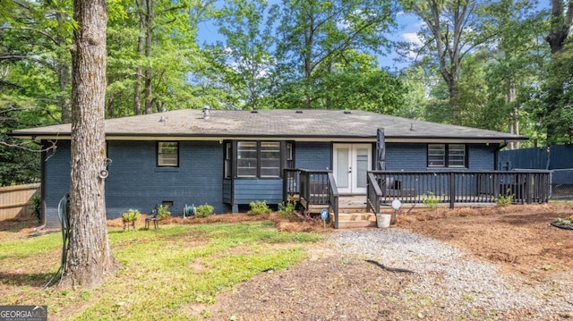 715 Wood Valley Rd, Mableton, GA 30126 - ranch-style house with fence, a deck, brick siding, and crawl space