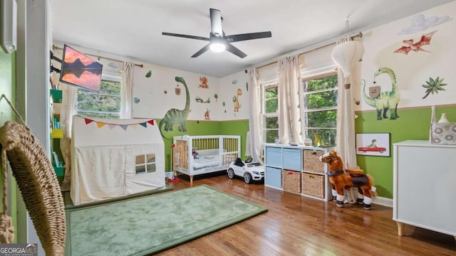 715 Wood Valley Rd, Mableton, GA 30126 - bedroom with wood finished floors and ceiling fan