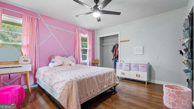 715 Wood Valley Rd, Mableton, GA 30126 - bedroom featuring wood finished floors, a ceiling fan, and a closet