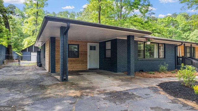 715 Wood Valley Rd, Mableton, GA 30126 - view of front of property with an attached carport, driveway, fence, and brick siding