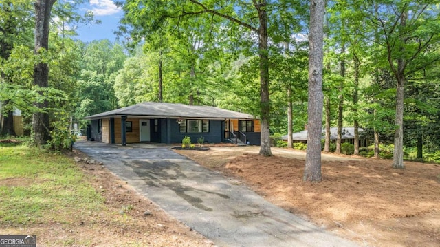 715 Wood Valley Rd, Mableton, GA 30126 - view of front of house with asphalt driveway and a carport