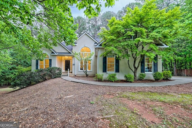 view of front of home featuring stucco siding