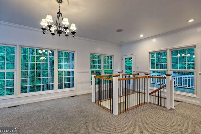 interior space featuring ornamental molding, carpet, visible vents, recessed lighting, and an inviting chandelier