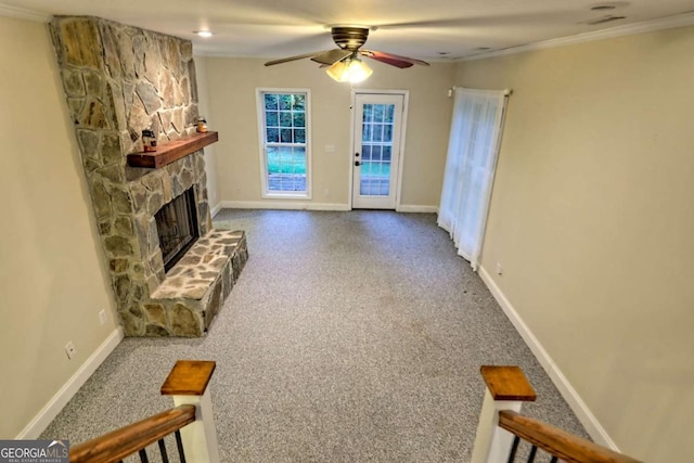 unfurnished living room with carpet flooring and baseboards