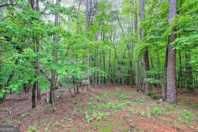 view of landscape with a view of trees