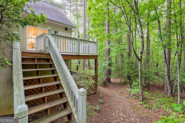 exterior space featuring stairway and a deck