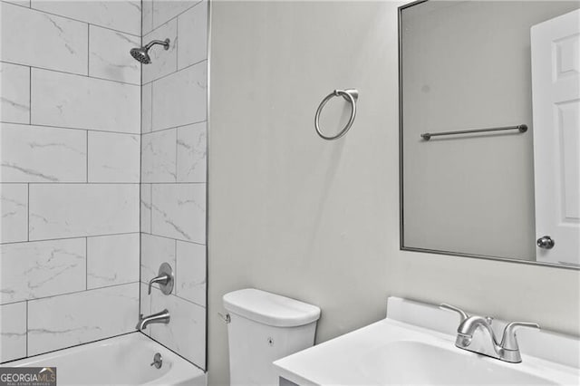 1939 Dunlap Ave, Atlanta, GA 30344 - full bathroom featuring toilet,  shower combination, and vanity