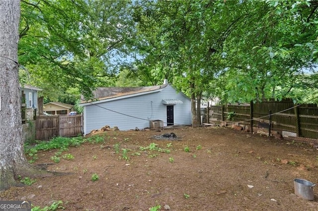 1939 Dunlap Ave, Atlanta, GA 30344 - view of yard featuring central AC and a fenced backyard