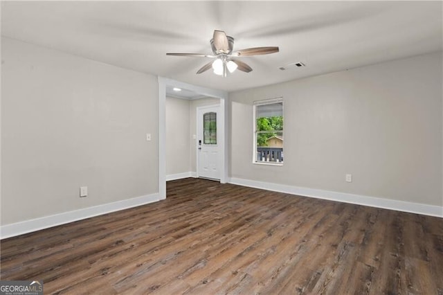 1939 Dunlap Ave, Atlanta, GA 30344 - spare room featuring baseboards, visible vents, ceiling fan, and dark wood-type flooring