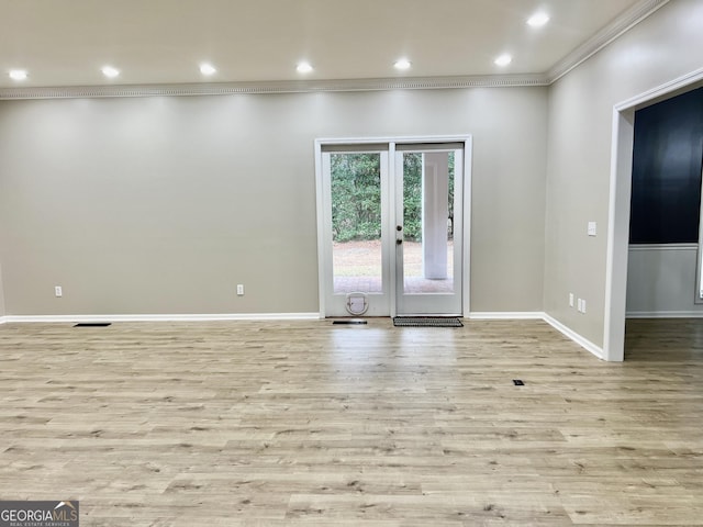 interior space with baseboards, recessed lighting, ornamental molding, and light wood-type flooring