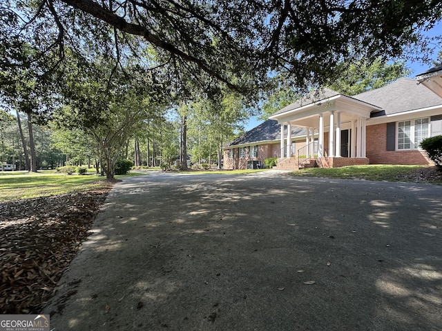 exterior space with aphalt driveway